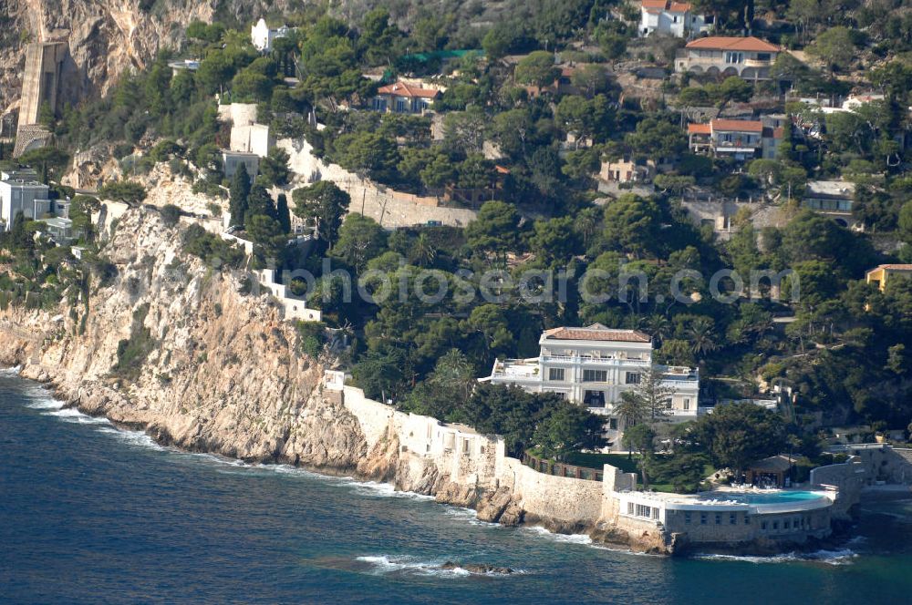 Èze from the bird's eye view: Blick auf das Hotel Le Cap Estel an der Avenue Raymond Poincaré im Stadtteil Èze-Bord-de-mer in Èze. Èze ist eine an der französischen Mittelmeerküste zwischen Nizza und Monaco gelegene Gemeinde mit ca. 2.500 Einwohnern. Sie liegt an einem steilen Küstenabschnitt und erstreckt sich von Èze-sur-Mer auf Meereshöhe über den malerischen Gemeindeteil Èze Village (430 m ü. NN) bis auf etwa 700 m Höhe. Kontakt: Le Cap Estel, Avenue Raymond Poincaré 1312, 06360 Eze-Bord-de-mer, Tel. +33 (0)4 93 76 29 29, Fax +33 (0)4 93 01 55 20, e-mail: contact@capestel.com