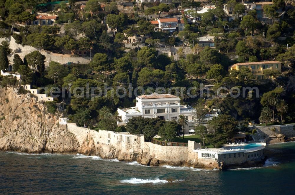 Aerial image Èze - Blick auf das Hotel Le Cap Estel an der Avenue Raymond Poincaré im Stadtteil Èze-Bord-de-mer in Èze. Èze ist eine an der französischen Mittelmeerküste zwischen Nizza und Monaco gelegene Gemeinde mit ca. 2.500 Einwohnern. Sie liegt an einem steilen Küstenabschnitt und erstreckt sich von Èze-sur-Mer auf Meereshöhe über den malerischen Gemeindeteil Èze Village (430 m ü. NN) bis auf etwa 700 m Höhe. Kontakt: Le Cap Estel, Avenue Raymond Poincaré 1312, 06360 Eze-Bord-de-mer, Tel. +33 (0)4 93 76 29 29, Fax +33 (0)4 93 01 55 20, e-mail: contact@capestel.com