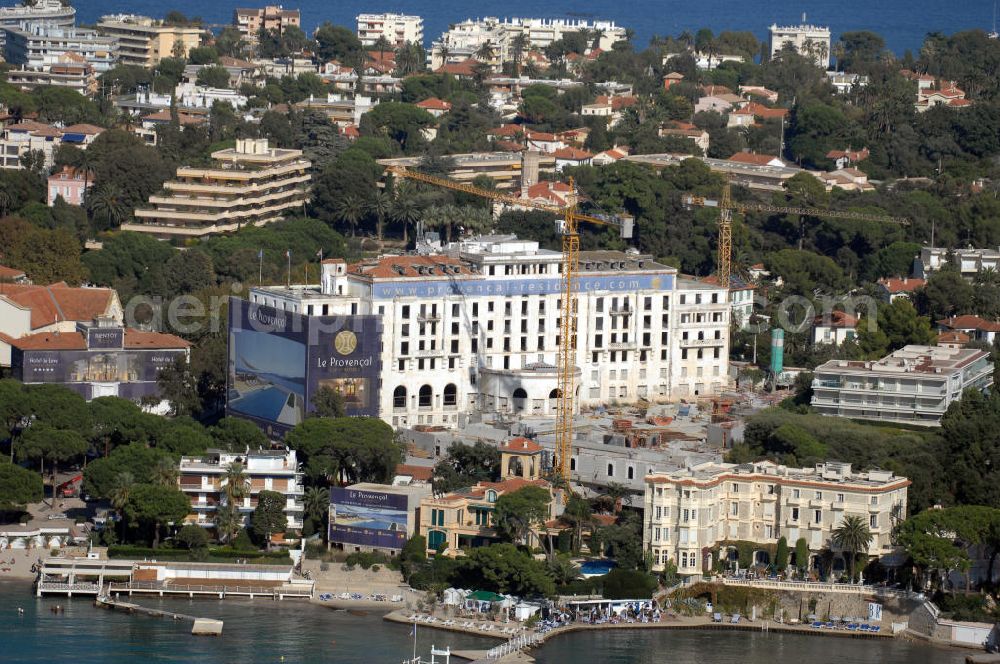 Aerial photograph Antibes - Blick auf das Hotel Le Provencal im Stadtteil Juan-les-Pins von Antibes. Juan-les-Pins ist ein Seebad an der Cote d' Azur. Der Ort gehört zur Stadt Antibes und liegt im Département Alpes-Maritimes in der Région Provence-Alpes-Cote d' Azur. Die Gemeinde hat zusammen mit Antibes etwa 74.000 Einwohner und nennt sich offiziell Antibes Juan-les-Pins. Nach Nizza sind es etwa 20 Kilometer und nach Cannes gut zwölf Kilometer. Kontakt: Provencal Investments SA, rue Saint Barthélémy, 06160 Juan-les-Pins, France, Tel. +33 (0)4 93 333 222, e-mail: info@provencal-residence.com