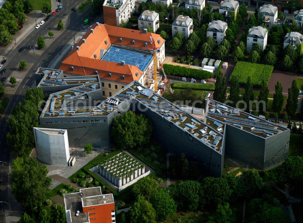 Aerial image Berlin - View of the Jewish Museum in Berlin. The museum building in Linden Street in Berlin's Kreuzberg district combines the baroque old part of the college building (the former seat of the High Court) with a new building. This zigzag structure is based on a design by architect Daniel Libeskind. The museum houses a permanent exhibition, several temporary exhibitions, archives, library and research facilities