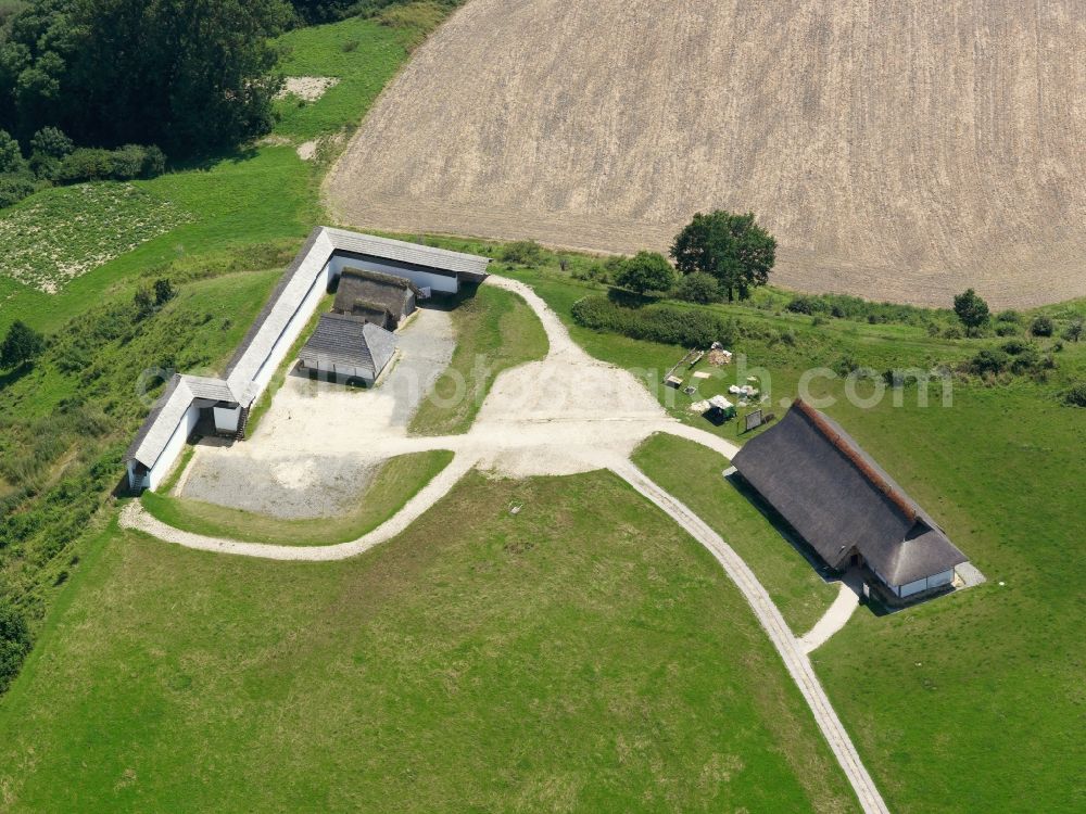 Heuneburg from above - Initial work on the Celtic Museum began in 1993 with the Auffschüttung and reconstruction of a grave mound. Between 1998 and 2001, several buildings were erected, including a mud-brick wall, a long house and home and workshops. The facility is intended to illustrate the life of the Celtic tribes of the region