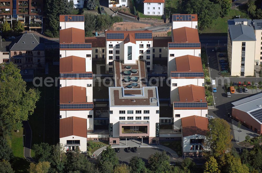 Aerial image Gelnhausen - Blick auf das Landratsamt Gelnhausen in Hessen. Der Bau der zwei modernen u-förmigen Verwaltungskörper endete im Mai 2005. In dem Gebäude haben nun die Verwaltungsämter von Hanau, Gelnhausen und Schlüchtern, zusammengefasst zur Main-Kinzig-Kreisverwaltung ihren Standort. Die Planung des Baus übernahm die Firma Prof. Christoph Mäckler Architekten. Die Umsetzung erfolgte durch die BAM Deutschland AG. Kontakt Architekt: Prof. Christoph Mäckler Architekten, Platz der Republik 6, 60325 Frankfurt am Main, Tel. +49(0)69 5050800 0, Fax +49(0)69 5050800 60, Email: chm@chm.de; Kontakt BAM: BAM Deutschland AG, Mönchhaldenstraße 26, 70191 Stuttgart, Tel. +49(0)711 25007 0, Fax +49(0)711 25007 150; Email: info@bam-deutschland.de