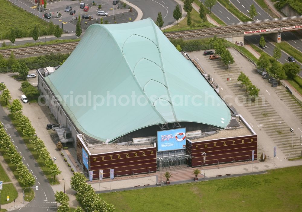 Aerial image Oberhausen - View of the Metronome Theater at the CentrO shopping mall in Oberhausen. The venue was built in 1999 for the musical Tabaluga & Lilli with the striking roof in the shape of a dragon's head. In 2005 a renovation was carried out to increase the capacity