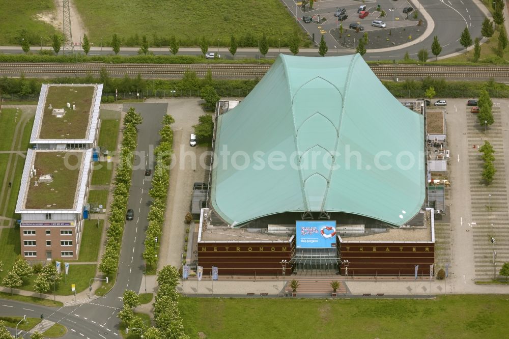 Aerial photograph Oberhausen - View of the Metronome Theater at the CentrO shopping mall in Oberhausen. The venue was built in 1999 for the musical Tabaluga & Lilli with the striking roof in the shape of a dragon's head. In 2005 a renovation was carried out to increase the capacity