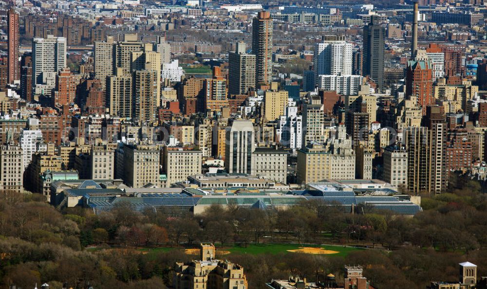 New York from the bird's eye view: View of the Metropolitan Museum of Art in the Central Park of New York's Manhattan district. It is located on Fifth Avenue and 82nd Street on the Upper East Side and is part of the Museum Mile. It was founded in April 1870 and opened in February 1872. The museum has about five million visitors per year