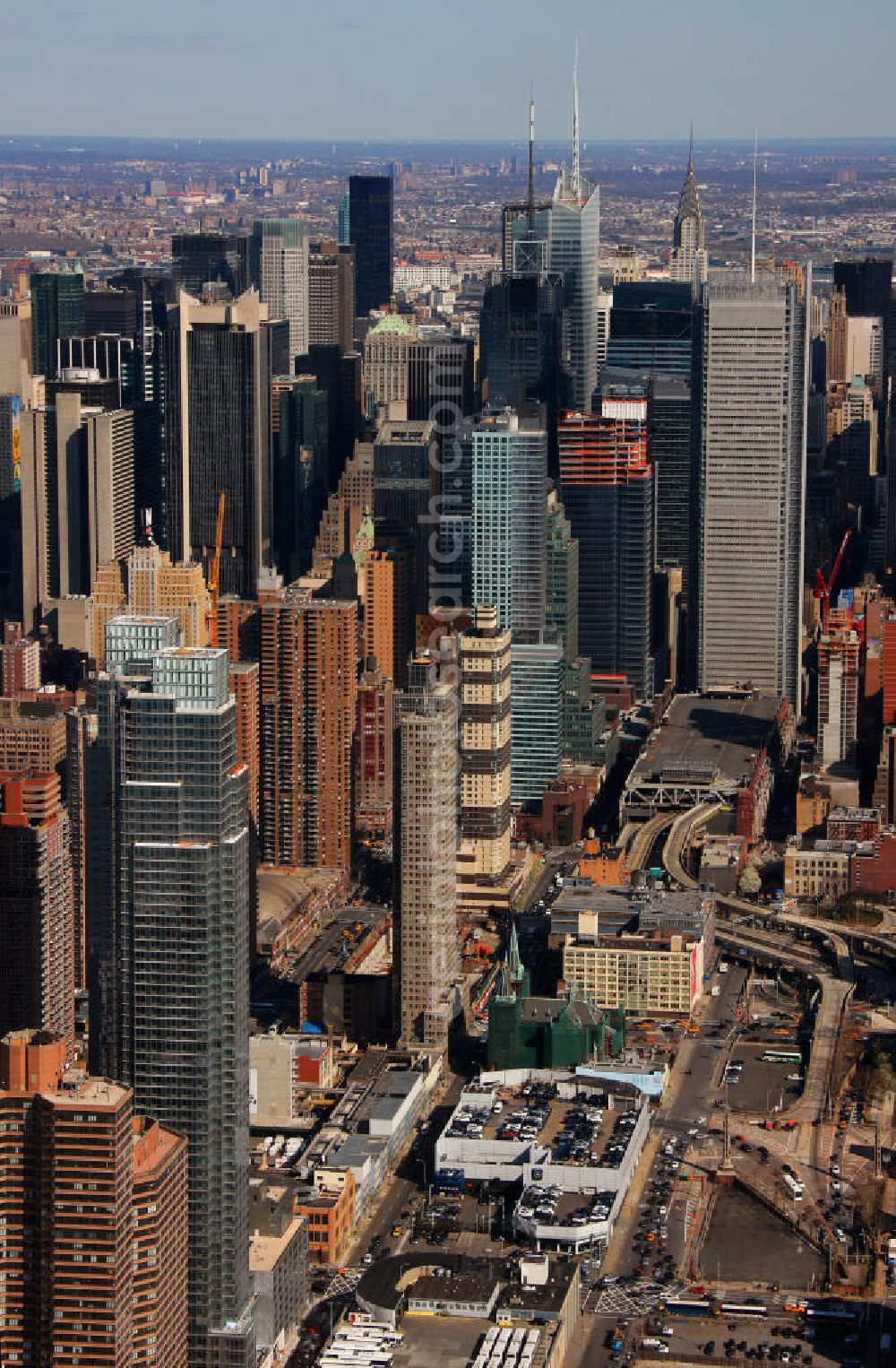 Aerial image New York - View of the Midtown neighborhood of Manhattan in New York with the Empire State Building, Bank of America Tower and the Chrysler Building. The Plaza District area is an important financial district in New York City. It is considered as the biggest financial center of the United States