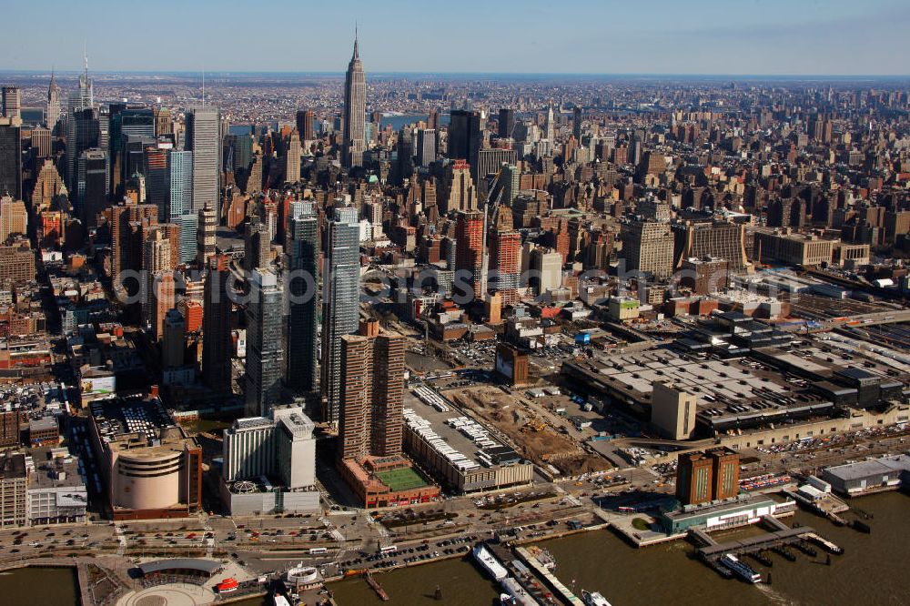 Aerial photograph New York - View of the Midtown neighborhood of Manhattan in New York with the Empire State Building, Bank of America Tower and the Chrysler Building. The Plaza District area is an important financial district in New York City. It is considered as the biggest financial center of the United States