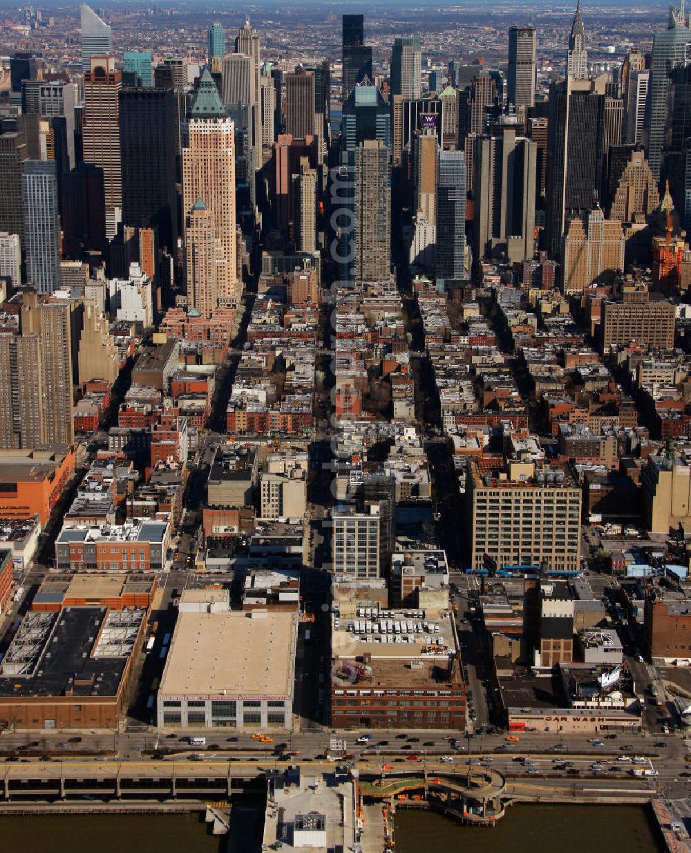 New York from above - View of the Midtown neighborhood of Manhattan in New York with the Empire State Building, Bank of America Tower and the Chrysler Building. The Plaza District area is an important financial district in New York City. It is considered as the biggest financial center of the United States