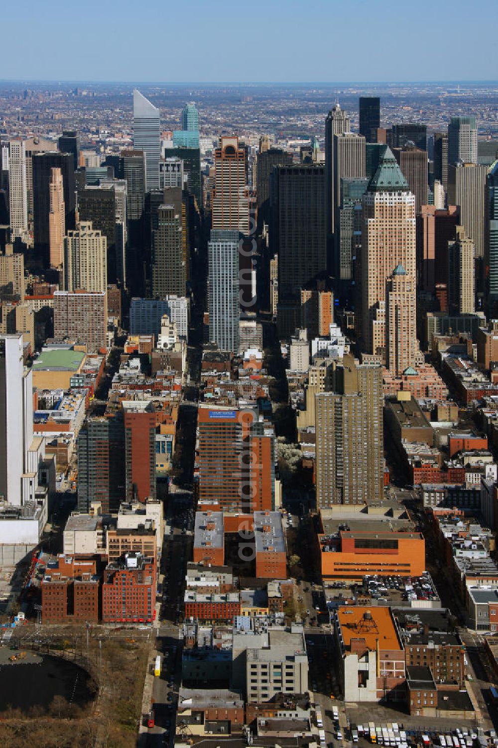 Aerial image New York - View of the Midtown neighborhood of Manhattan in New York with the Empire State Building, Bank of America Tower and the Chrysler Building. The Plaza District area is an important financial district in New York City. It is considered as the biggest financial center of the United States