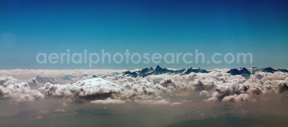 Saint-Gervais-les-Bains from above - View at the Mont Blanc mountain mass above the clouds in the French Alps