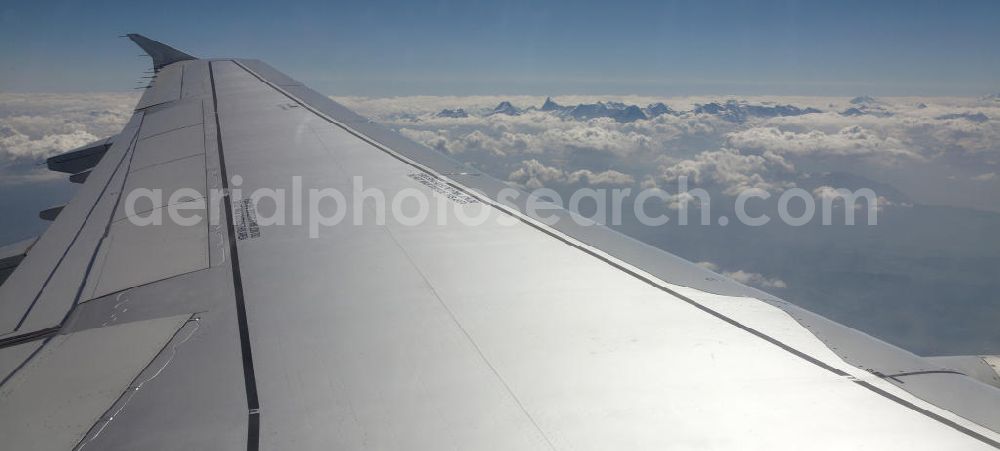 Saint-Gervais-les-Bains from the bird's eye view: View at the Mont Blanc mountain mass above the clouds in the French Alps