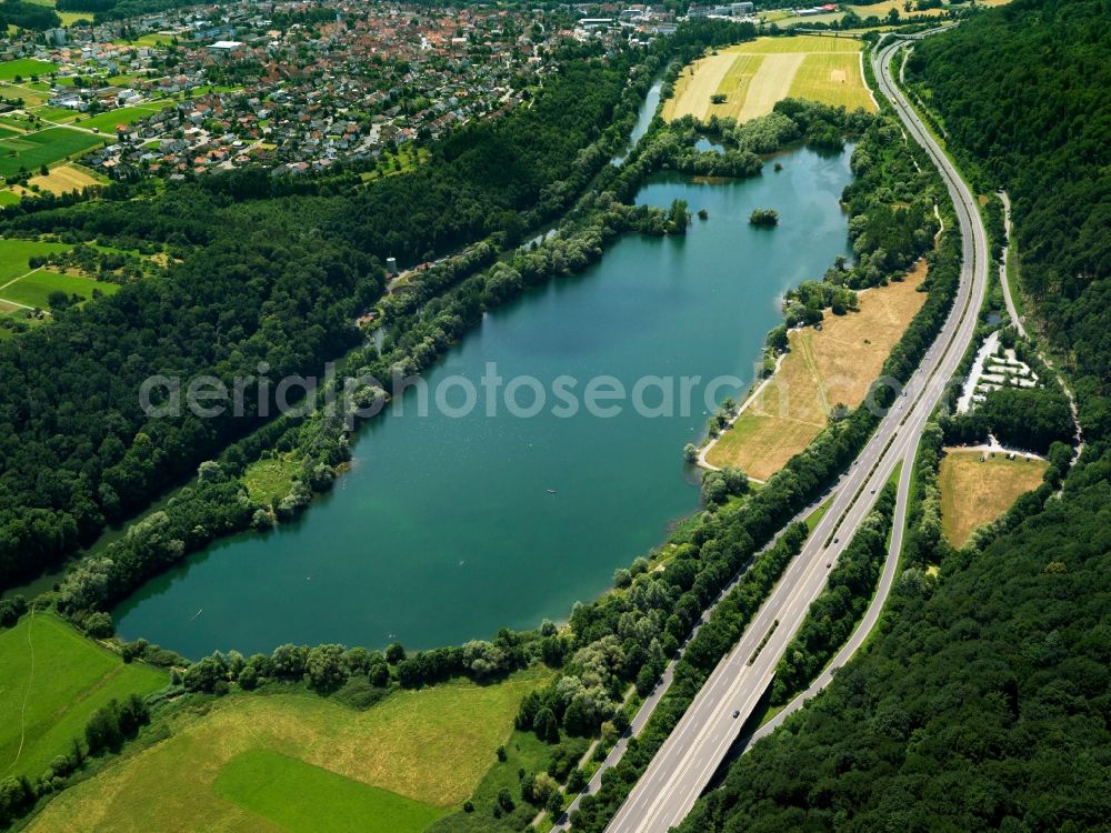 Kirchentellinsfurt from above - The channel of the river Neckar in the county of Kirchentellinsfurt in the state of Baden-Württemberg. Located in the Neckar valley, a small dam and channel build a recreational area as well as two small lakes filled with water from the river. The larger one of the lakes is the quarry pond Epple