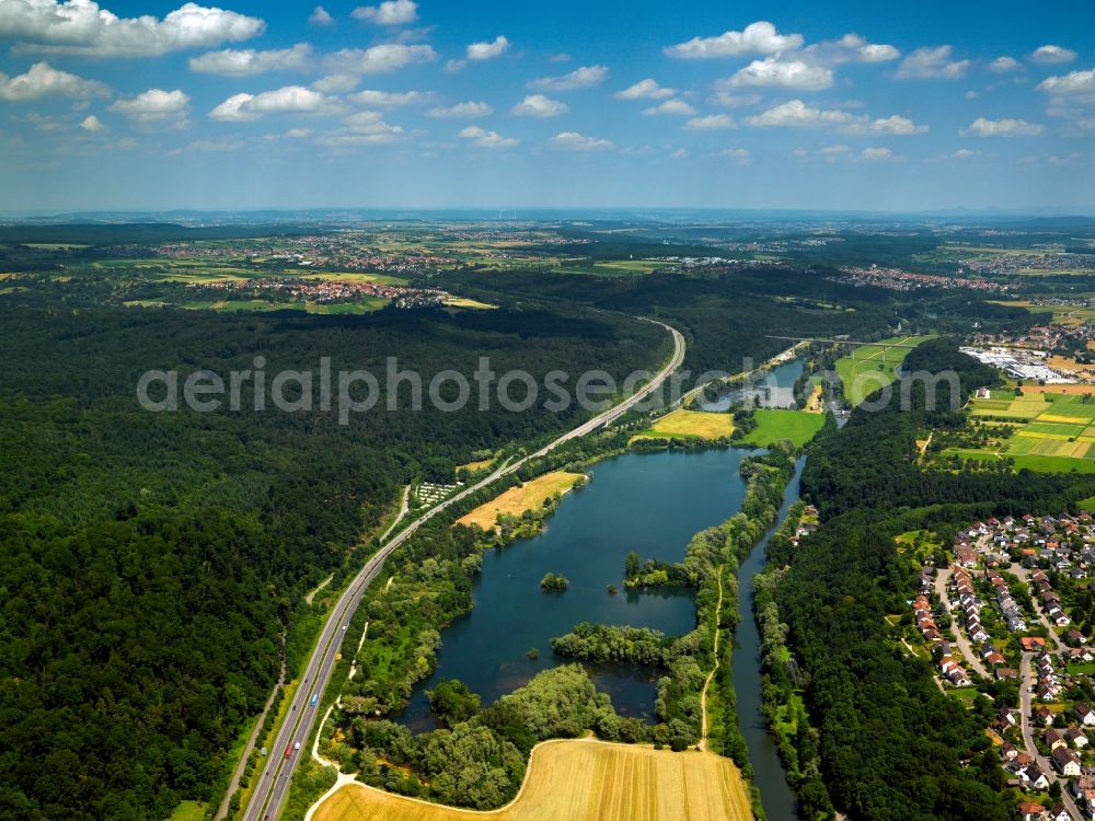 Aerial image Kirchentellinsfurt - The channel of the river Neckar in the county of Kirchentellinsfurt in the state of Baden-Württemberg. Located in the Neckar valley, a small dam and channel build a recreational area as well as two small lakes filled with water from the river. The larger one of the lakes is the quarry pond Epple