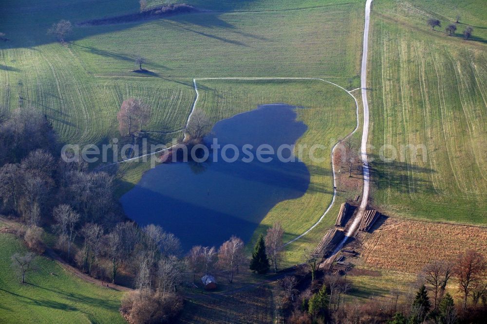 Schopfheim from above - Landscape at Schopfheim in Baden-Wuerttemberg with the nature reserve Eichener See. The lake in the karst appears only after heavy rainfall and sometimes remains for years disappeared