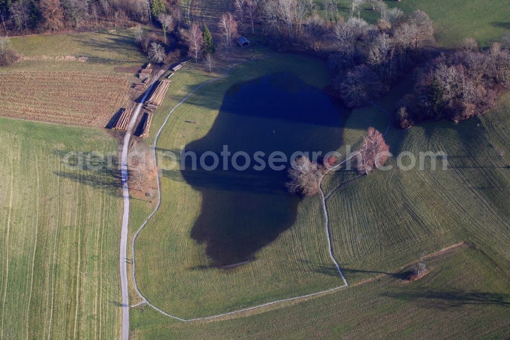 Schopfheim from the bird's eye view: Landscape at Schopfheim in Baden-Wuerttemberg with the nature reserve Eichener See. The lake in the karst appears only after heavy rainfall and sometimes remains for years disappeared