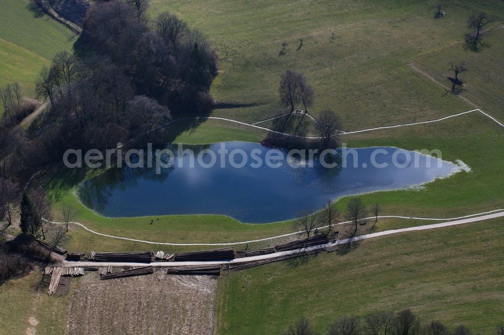 Schopfheim from the bird's eye view: Landscape at Schopfheim in Baden-Wuerttemberg with the nature reserve Eichener See. The lake in the karst appears only after heavy rainfall and sometimes remains for years disappeared