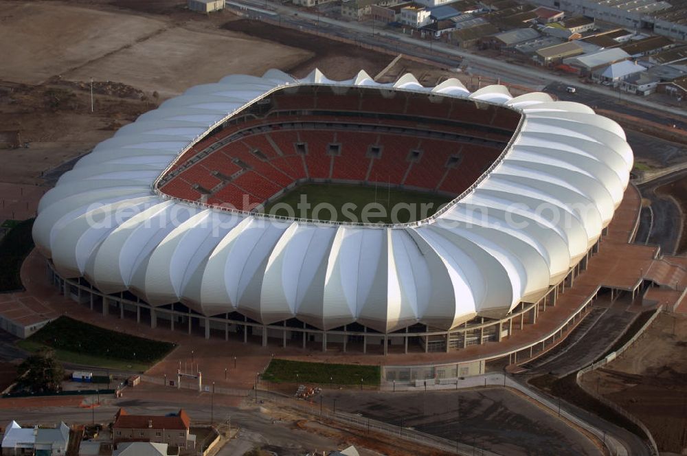 Port Elizabeth from the bird's eye view: Blick auf das Nelson - Mandela - Bay - Stadion in Port Elizabeth in der Provinz Eastern Cape in Südafrika vor der Fußball-Weltmeisterschaft 2010. Der architektonische Entwurf stammt vom deutschen Architekturbüro Gerkan, Marg und Partner (gmp), die Tragwerksplanung für das Dach erfolgt durch Ingenieurbüro Schlaich, Bergermann und Partner. Das Stadion steht am North End Lake. View of the Nelson-Mandela-Bay-Stadium in Port Elizabeth in South Africa for the FIFA World Cup 2010.