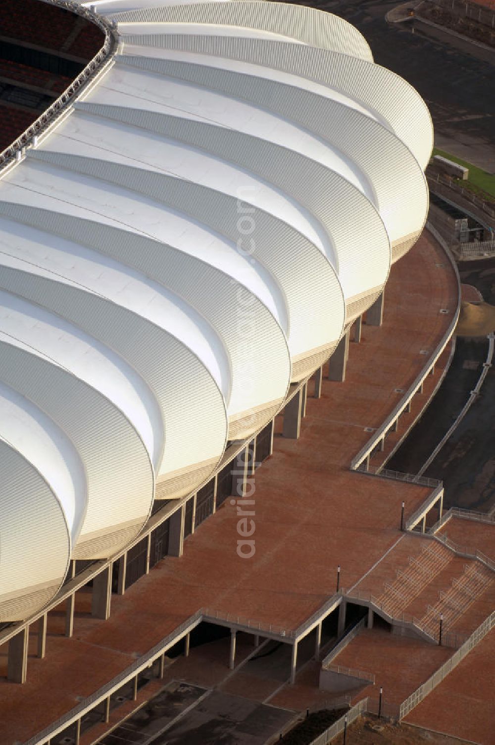 Aerial image Port Elizabeth - Blick auf das Nelson - Mandela - Bay - Stadion in Port Elizabeth in der Provinz Eastern Cape in Südafrika vor der Fußball-Weltmeisterschaft 2010. Der architektonische Entwurf stammt vom deutschen Architekturbüro Gerkan, Marg und Partner (gmp), die Tragwerksplanung für das Dach erfolgt durch Ingenieurbüro Schlaich, Bergermann und Partner. Das Stadion steht am North End Lake. View of the Nelson-Mandela-Bay-Stadium in Port Elizabeth in South Africa for the FIFA World Cup 2010.