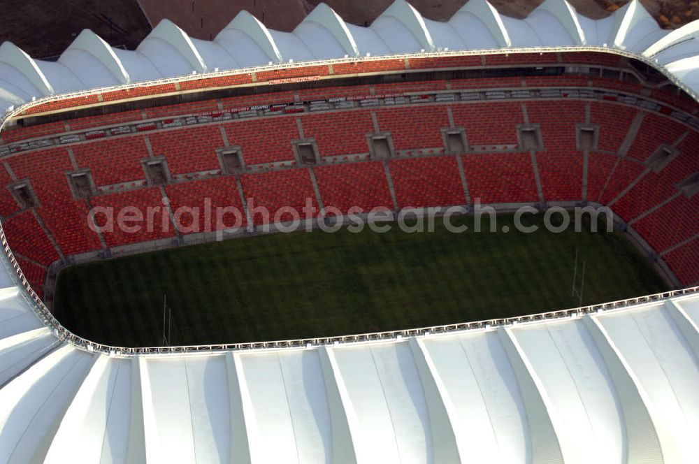 Aerial photograph Port Elizabeth - Blick auf das Nelson - Mandela - Bay - Stadion in Port Elizabeth in der Provinz Eastern Cape in Südafrika vor der Fußball-Weltmeisterschaft 2010. Der architektonische Entwurf stammt vom deutschen Architekturbüro Gerkan, Marg und Partner (gmp), die Tragwerksplanung für das Dach erfolgt durch Ingenieurbüro Schlaich, Bergermann und Partner. Das Stadion steht am North End Lake. View of the Nelson-Mandela-Bay-Stadium in Port Elizabeth in South Africa for the FIFA World Cup 2010.