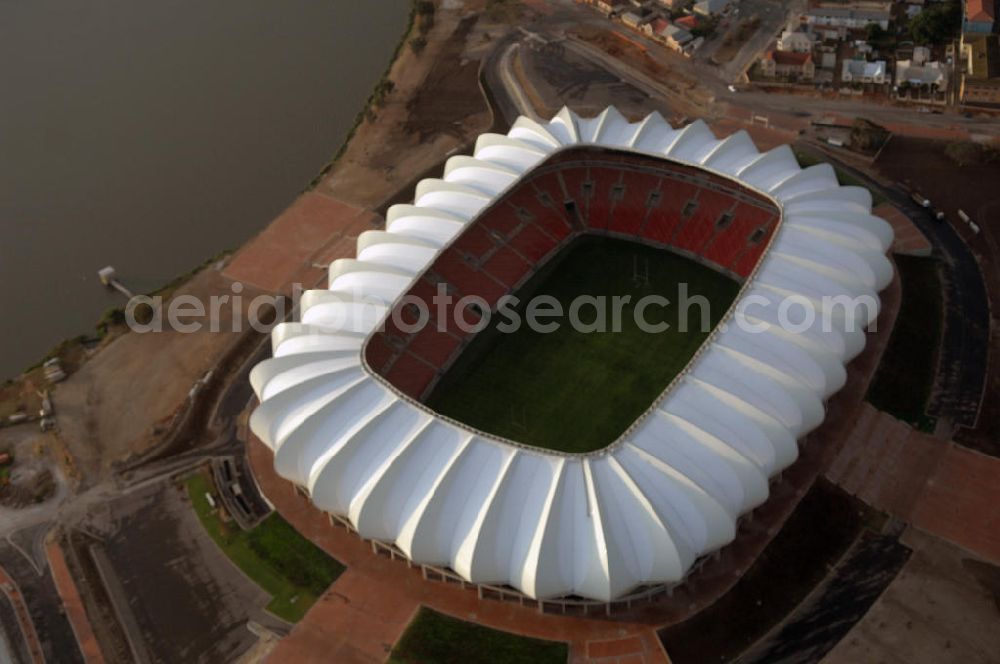 Port Elizabeth from the bird's eye view: Blick auf das Nelson - Mandela - Bay - Stadion in Port Elizabeth in der Provinz Eastern Cape in Südafrika vor der Fußball-Weltmeisterschaft 2010. Der architektonische Entwurf stammt vom deutschen Architekturbüro Gerkan, Marg und Partner (gmp), die Tragwerksplanung für das Dach erfolgt durch Ingenieurbüro Schlaich, Bergermann und Partner. Das Stadion steht am North End Lake. View of the Nelson-Mandela-Bay-Stadium in Port Elizabeth in South Africa for the FIFA World Cup 2010.