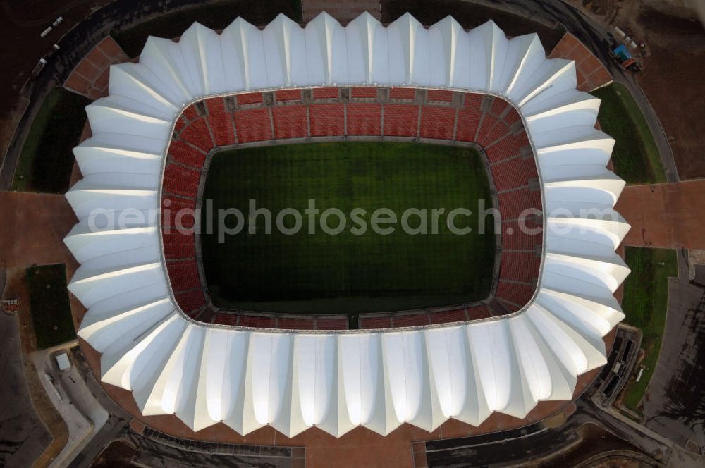 Aerial image Port Elizabeth - Blick auf das Nelson - Mandela - Bay - Stadion in Port Elizabeth in der Provinz Eastern Cape in Südafrika vor der Fußball-Weltmeisterschaft 2010. Der architektonische Entwurf stammt vom deutschen Architekturbüro Gerkan, Marg und Partner (gmp), die Tragwerksplanung für das Dach erfolgt durch Ingenieurbüro Schlaich, Bergermann und Partner. Das Stadion steht am North End Lake. View of the Nelson-Mandela-Bay-Stadium in Port Elizabeth in South Africa for the FIFA World Cup 2010.