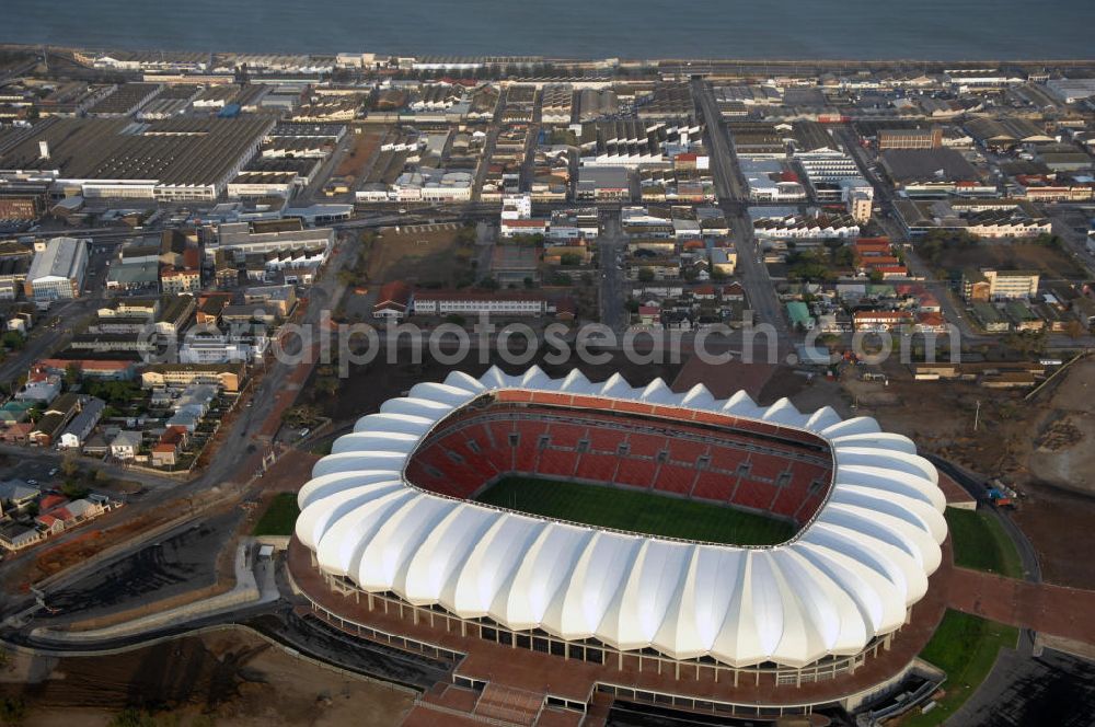 Aerial photograph Port Elizabeth - Blick auf das Nelson - Mandela - Bay - Stadion in Port Elizabeth in der Provinz Eastern Cape in Südafrika vor der Fußball-Weltmeisterschaft 2010. Der architektonische Entwurf stammt vom deutschen Architekturbüro Gerkan, Marg und Partner (gmp), die Tragwerksplanung für das Dach erfolgt durch Ingenieurbüro Schlaich, Bergermann und Partner. Das Stadion steht am North End Lake. View of the Nelson-Mandela-Bay-Stadium in Port Elizabeth in South Africa for the FIFA World Cup 2010.