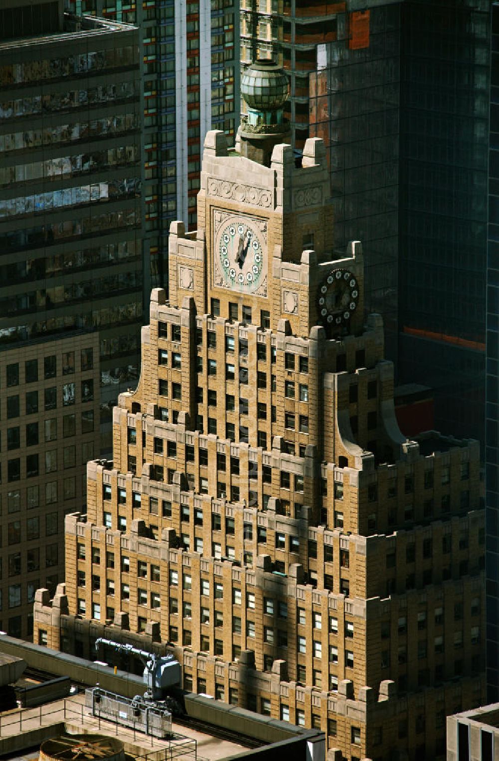 Aerial photograph New York - The Paramount Building is a skyscraper in Manhattan at the Broadway in the style of Art Deco It was built from 1926 until 1927 for Paramount Pictures. In addition to the offices of the film company, the building also had a large movie theater. The glass ball and the clock is illuminated at night