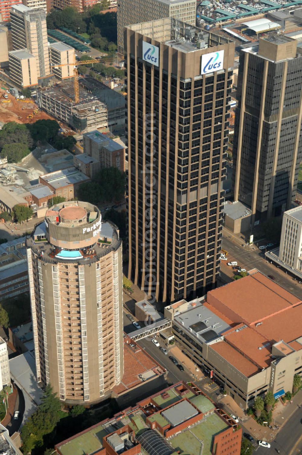 Aerial image JOHANNESBURG - The Protea Hotel Parktonian All Suite an the UCS Building in Johannesburg, South Africa. The special feature of the Protea Hotel Parktonian All Suite is, that all rooms are suites. Since 2011, the UCS Building is the headquarter of the UCS Group Limited, a group of IT companies which are specialized in the fabrication of software and any kind of services in this sector