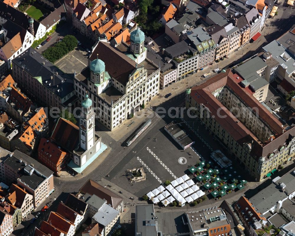 Augsburg from above - The town hall and the tower Perlachturm in the inner city of Augsburg in the state of Bavaria. The complex is located in the historic city center of Augsburg on the square Rathausplatz which is also home to the fountain Augustusbrunnen, one of three fountains on Maximilian street. The tower, 70m high, was originally built as a watch tower. The city hall is landmark of the city and was built from 1615 onwards. It includes a museum and the restaurant Ratskeller