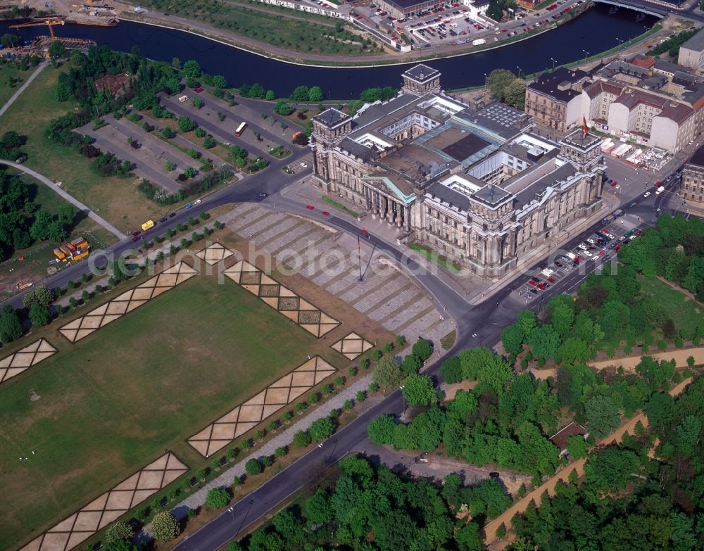 Berlin from above - The Reichstag building at the Republic Square in Berlin since 1999, seat of the German Parliament. Here without a dome