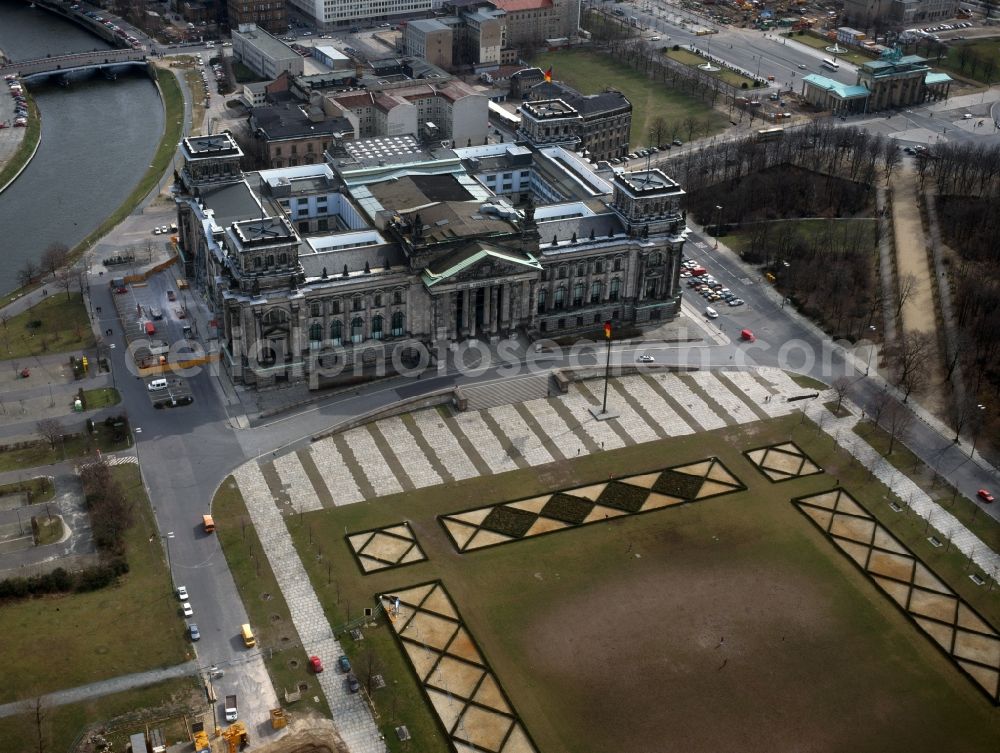 Berlin from above - The Reichstag building at the Republic Square in Berlin since 1999, seat of the German Parliament. Here without a dome