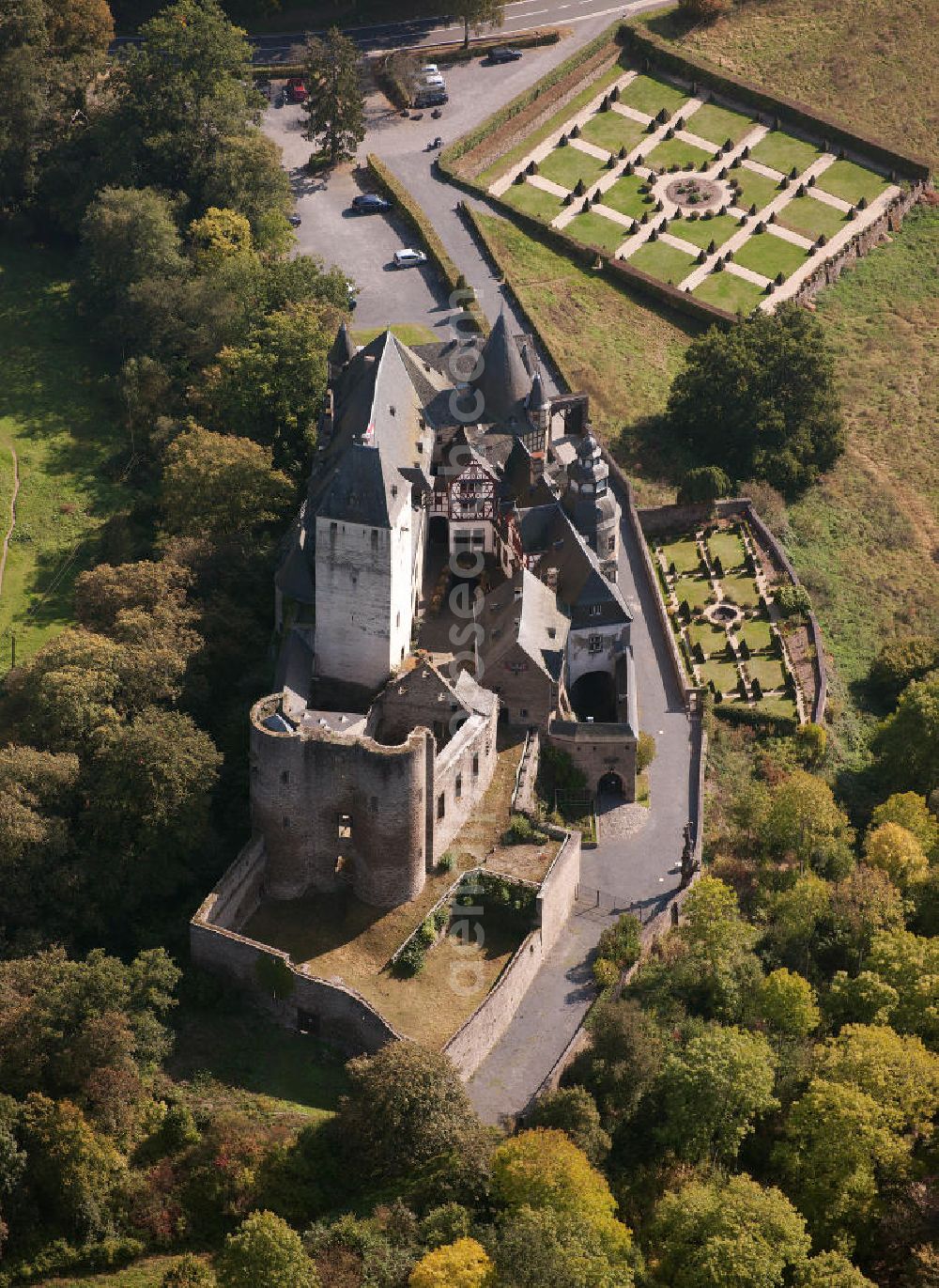 Aerial image Mayen - The castle Bürresheim stands in the Northwest of Mayen on a rocky outcrop in Nettetal. Bürresheim was built in the 12th century by its then owners, the noble and free Eberhard Mettfried. Today it is open for tours