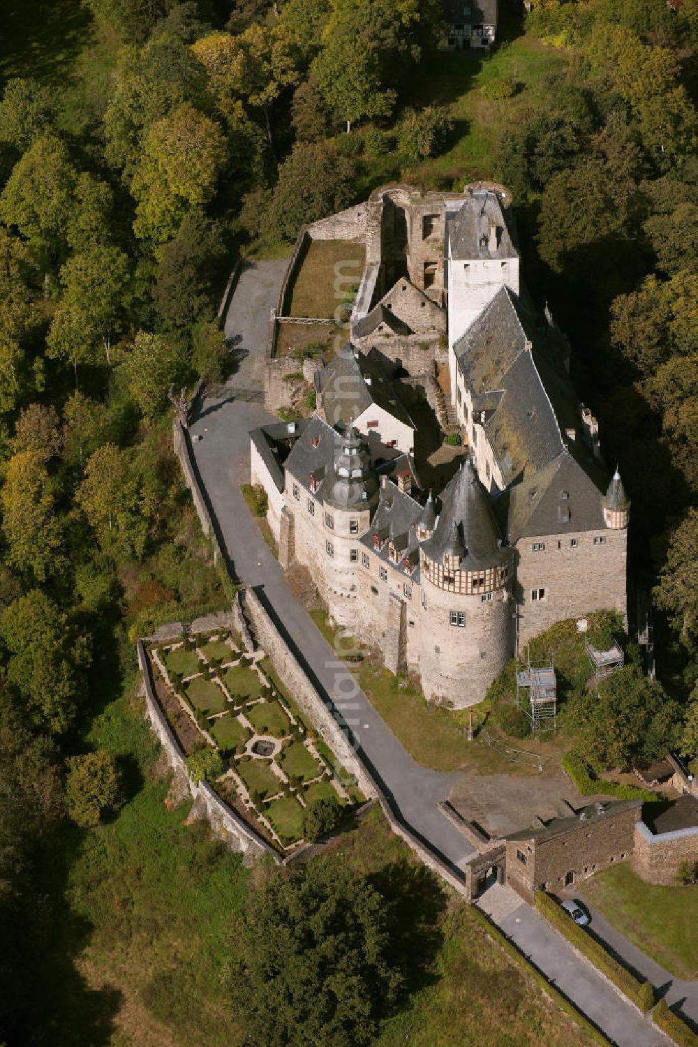 Mayen from above - The castle Bürresheim stands in the Northwest of Mayen on a rocky outcrop in Nettetal. Bürresheim was built in the 12th century by its then owners, the noble and free Eberhard Mettfried. Today it is open for tours