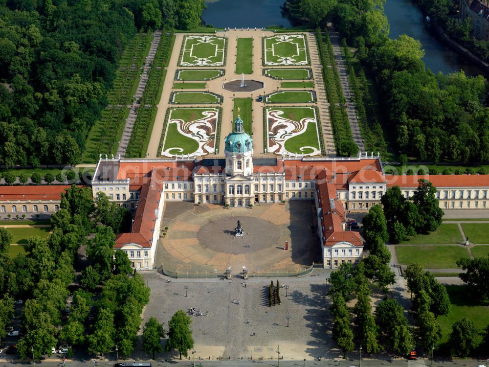 Berlin from above - Charlottenburg Palace today is the largest residence of the Hohenzollern in Berlin. Originally built by Elector Frederick III as a summer residence for his wife Sophie Charlotte in 1699, the palace was later extended into a stately building with a cours d`honneur