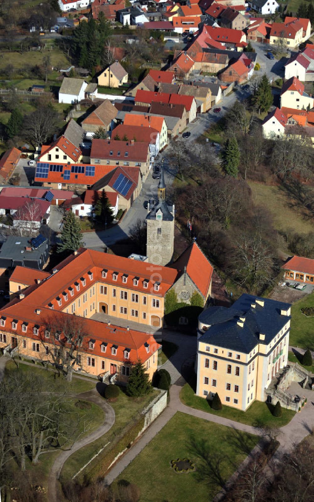 Aerial image Ettersburg - The castle Ettersburg is located on the Ettersberg, an elongated ridge. Since 1998 it belongs as a part of the ensemble Classical Weimar to the UNESCO World Heritage Sites. Duke Wilhelm Ernst of Saxe-Weimar built the castle between 1706 until 1712. The Cultural Office LaRete operates a project office in the castle, which can also be booked as a venue