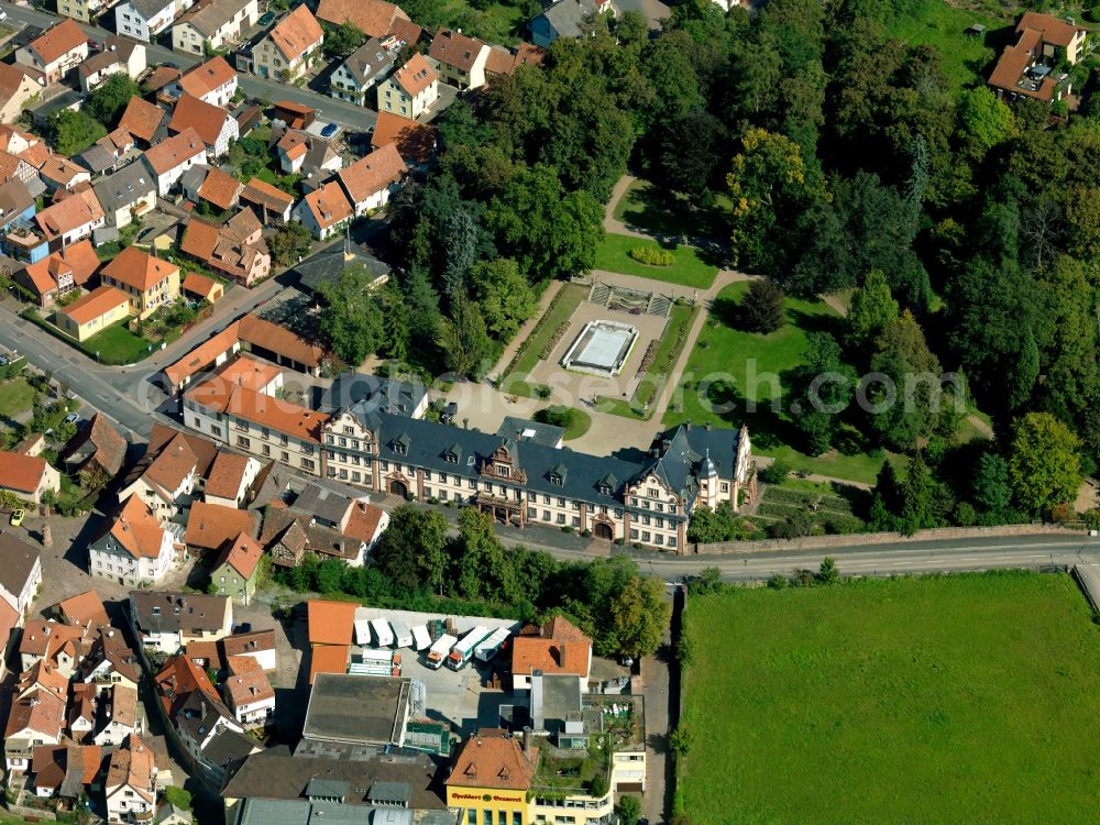 Kreuzwertheim from the bird's eye view: The castle in Kreuzwertheim in the state of Bavaria. The Schloss (palatial castle), once built as a widow's seat, and still the Löwenstein-Wertheim-Freudenberg princely family's seat today, is a prominent feature in the community