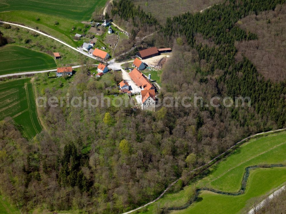 Blaustein from above - The Kleine Lautertal - small Lauter Valley - in the community of Blaustein in the state of Baden-Württemberg. The river Lauter is a side arm of the river Blau. The valley is the second largest nature preserve area of the region. It is a favoured spot for canoeing and runs through Herrlingen, a part of the county of Blaustein. Visible on the small rock is the castle of Oberherrlingen located in this part of the county