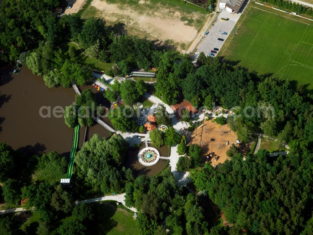 Aerial photograph Heroldsbach - The palace Thurn in Heroldsbach in the state of Bavaria. The former summer residence is enclosed by trees. The adjacent park was opened in 1975 and includes the fun park Schloss Thurn with about 30 attractions for visitors. The park itself has very old trees with an oak of about 400 years