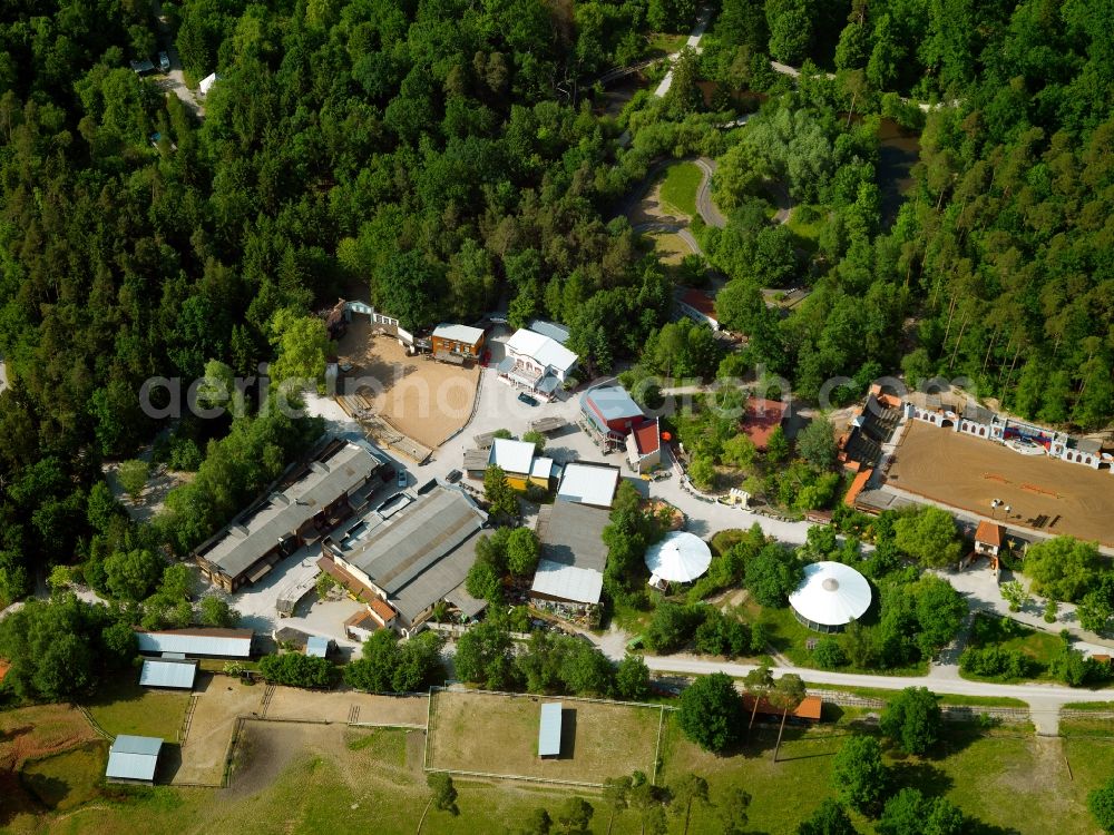 Aerial image Heroldsbach - The palace Thurn in Heroldsbach in the state of Bavaria. The former summer residence is enclosed by trees. The adjacent park was opened in 1975 and includes the fun park Schloss Thurn with about 30 attractions for visitors. The park itself has very old trees with an oak of about 400 years