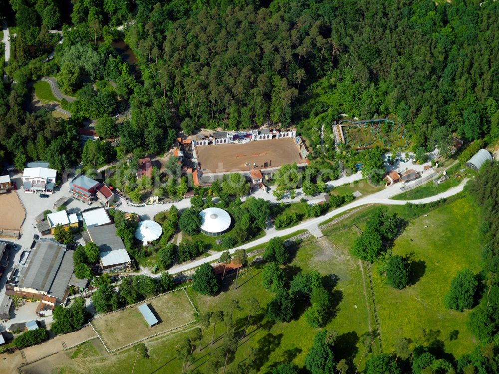 Aerial photograph Heroldsbach - The palace Thurn in Heroldsbach in the state of Bavaria. The former summer residence is enclosed by trees. The adjacent park was opened in 1975 and includes the fun park Schloss Thurn with about 30 attractions for visitors. The park itself has very old trees with an oak of about 400 years