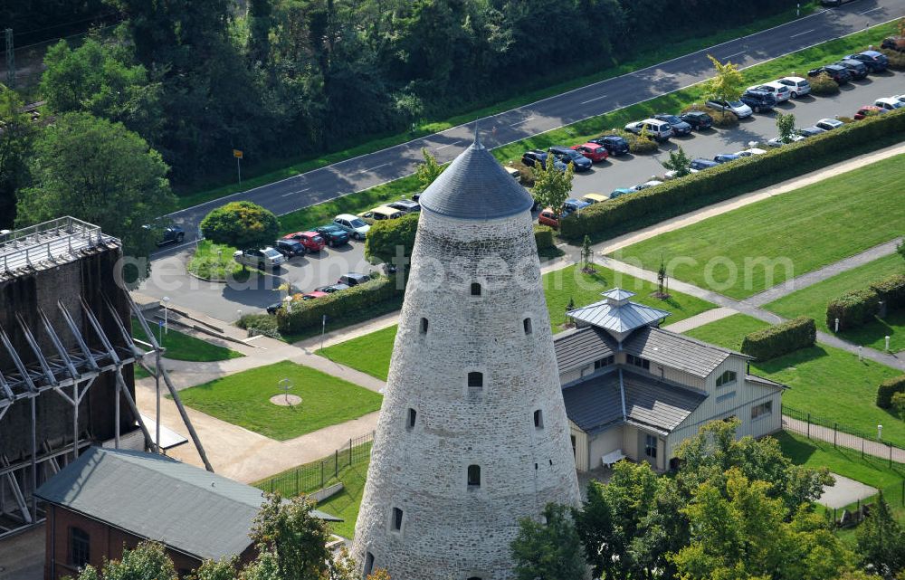 Aerial photograph Schönebeck - The brine tower of the salt works which are located in the Bad Salzelmen district of Schönebeck in Saxony-Anhalt were built in 1756 and are part of the Solepark. A salt work is a plant for salt production. Since 1890, it is used only as an element of cure