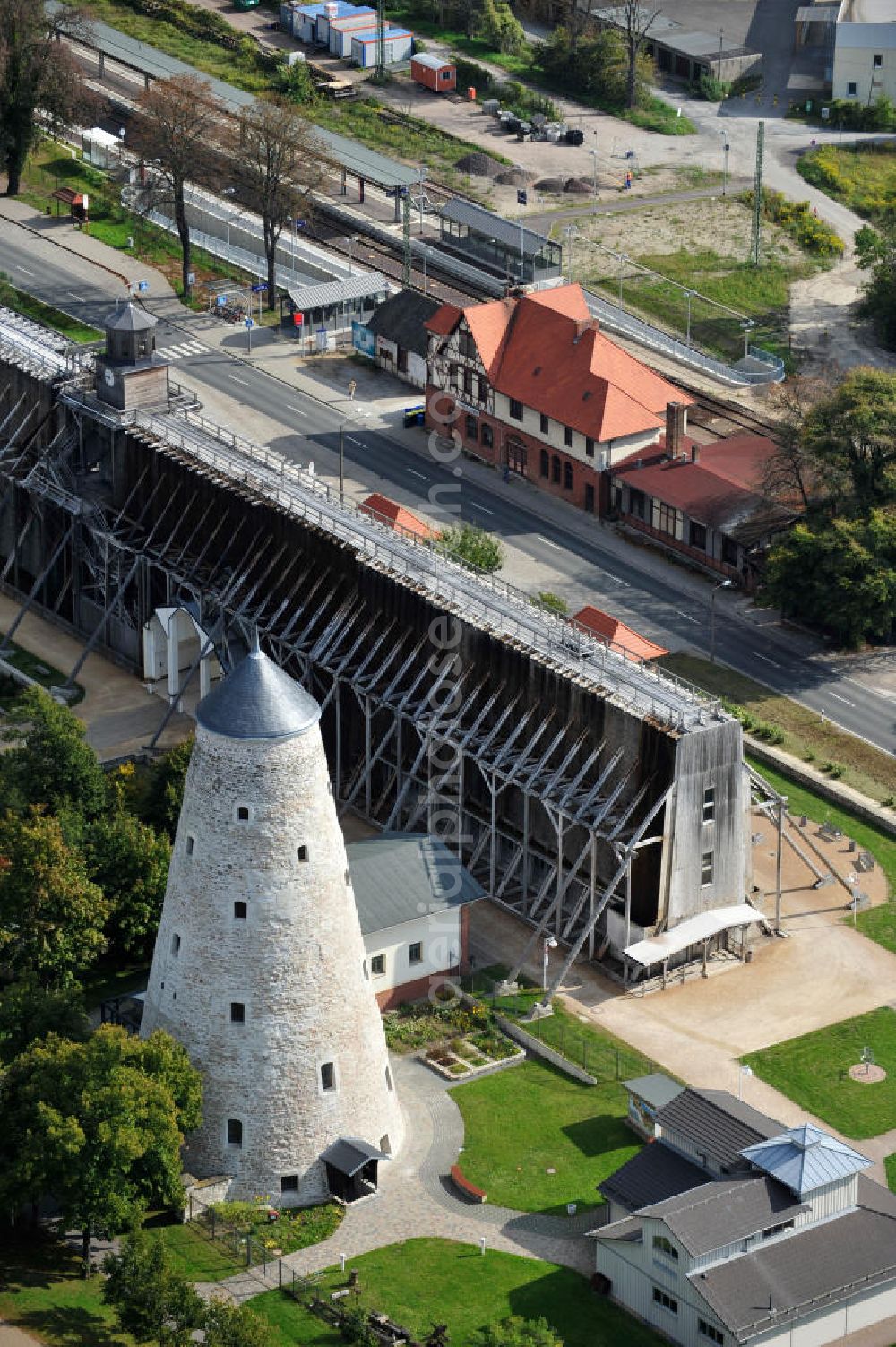 Schönebeck from the bird's eye view: The brine tower of the salt works which are located in the Bad Salzelmen district of Schönebeck in Saxony-Anhalt were built in 1756 and are part of the Solepark. A salt work is a plant for salt production. Since 1890, it is used only as an element of cure