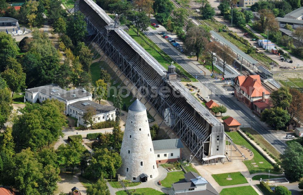 Aerial image Schönebeck - The brine tower of the salt works which are located in the Bad Salzelmen district of Schönebeck in Saxony-Anhalt were built in 1756 and are part of the Solepark. A salt work is a plant for salt production. Since 1890, it is used only as an element of cure