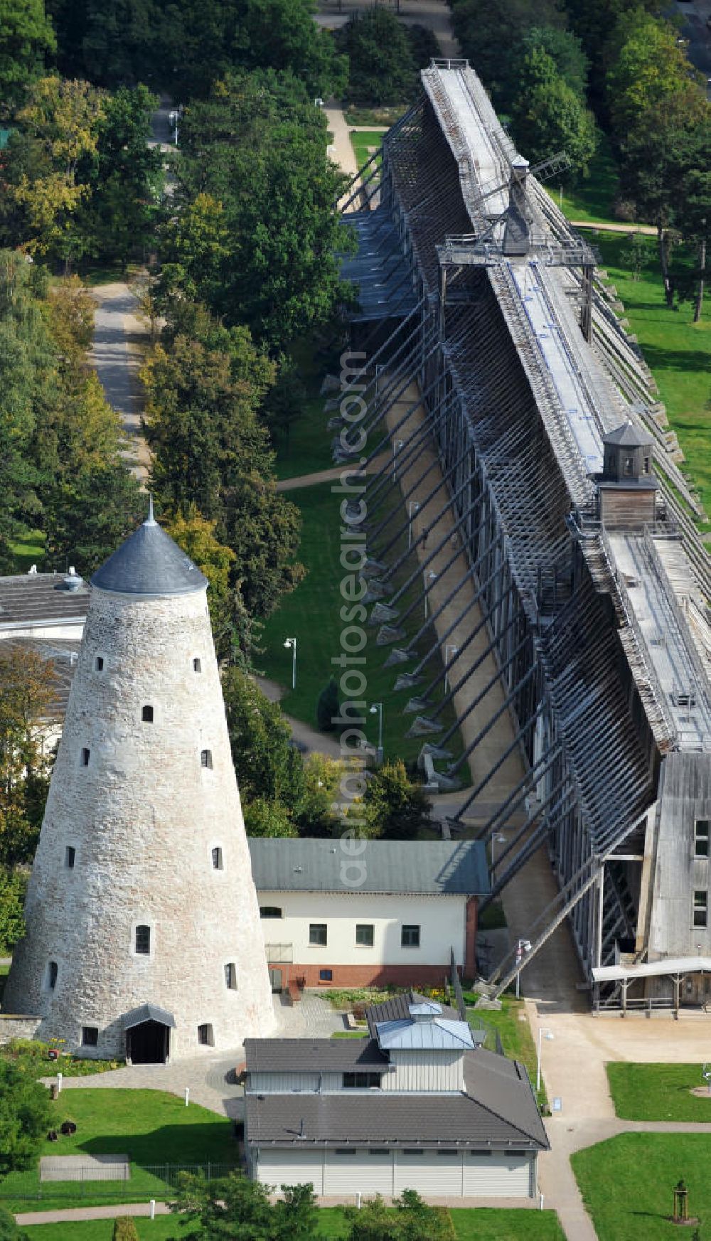 Schönebeck from above - The brine tower of the salt works which are located in the Bad Salzelmen district of Schönebeck in Saxony-Anhalt were built in 1756 and are part of the Solepark. A salt work is a plant for salt production. Since 1890, it is used only as an element of cure