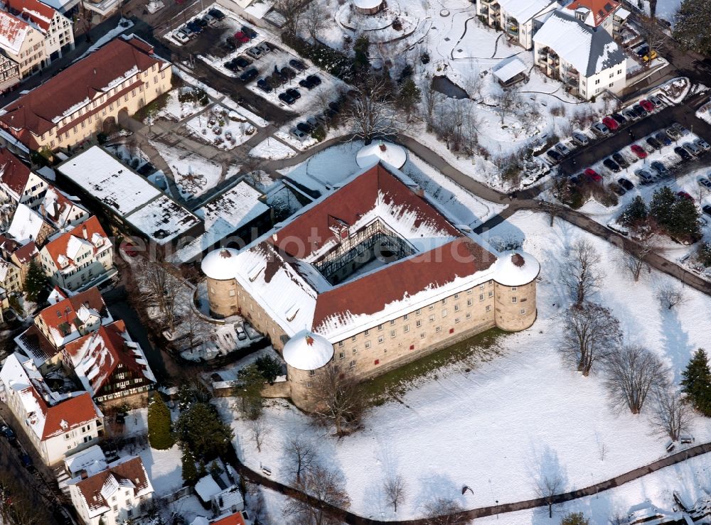 Schorndorf from above - Palace Schorndorf in the town of Schorndorf in the state of Baden-Württemberg. The castle remains from a larger compound of the Renaissance at the edge of the historic city center. It is surrounded by a park. Opposite the Palace with its 4 towers lies the hunting seat and castle, dated to the 16th century