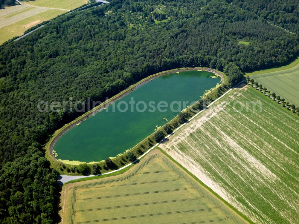 Aerial photograph Tübingen - The water reservoir in the Pfrondorf part of the city of Tübingen in the state of Baden-Württemberg. The reservoir is located amidst fields on the edge of a wood in the North Eastern part of the town