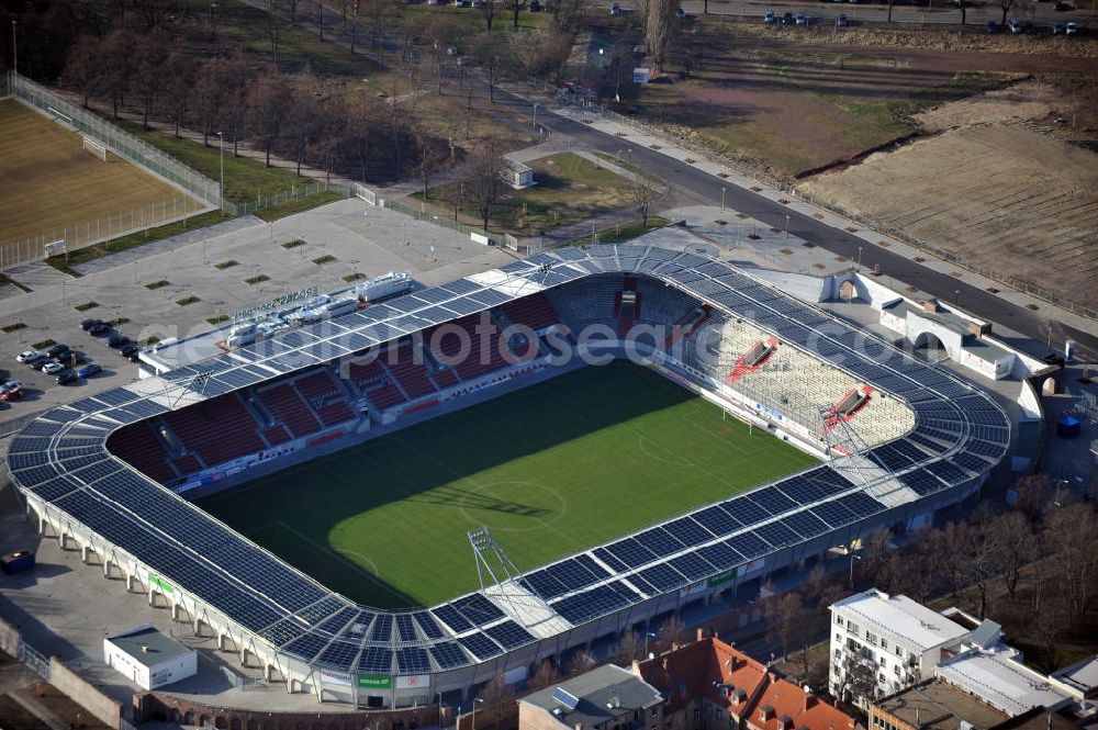 Halle / Saale from above - Look at the Erdgas sports parkl, a football stadium that was opened in 2011. It was built on theground of the old Kurt Wabbel stadium that was demolished in summer 2010. The exterior wall and the arches of the historic stadium are landmarked so that the new stadium had to retain those. The costs of around € 17 million was shared by the town and the state of Saxony-Anhalt. The new stadium has a capacity of 15 057 seats and stands. On the roof has been installed a photovoltaic system. Primary user is the football club Hallescher FC