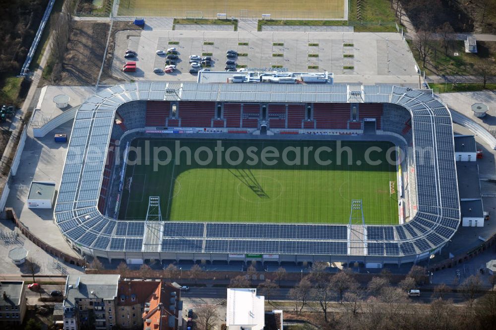 Aerial image Halle / Saale - Look at the Erdgas sports parkl, a football stadium that was opened in 2011. It was built on theground of the old Kurt Wabbel stadium that was demolished in summer 2010. The exterior wall and the arches of the historic stadium are landmarked so that the new stadium had to retain those. The costs of around € 17 million was shared by the town and the state of Saxony-Anhalt. The new stadium has a capacity of 15 057 seats and stands. On the roof has been installed a photovoltaic system. Primary user is the football club Hallescher FC