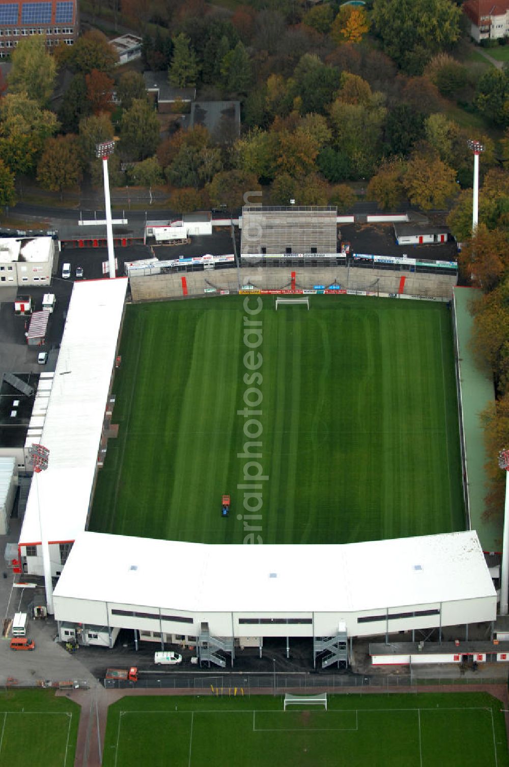 Ahlen from the bird's eye view: Blick auf das Wersestadion. Das reihne Fußballstaion wurde 1997 erbaut und ist die Spielstätte des Fußballvereins Rot-Weiß Ahlen. Es fast ca. 10.500 Zuschauer. Kontakt: ROT WEISS AHLEN e.V., August-Kirchner-Straße 14, 59229 Ahlen, Tel. 02382 / 96 88 90 11,