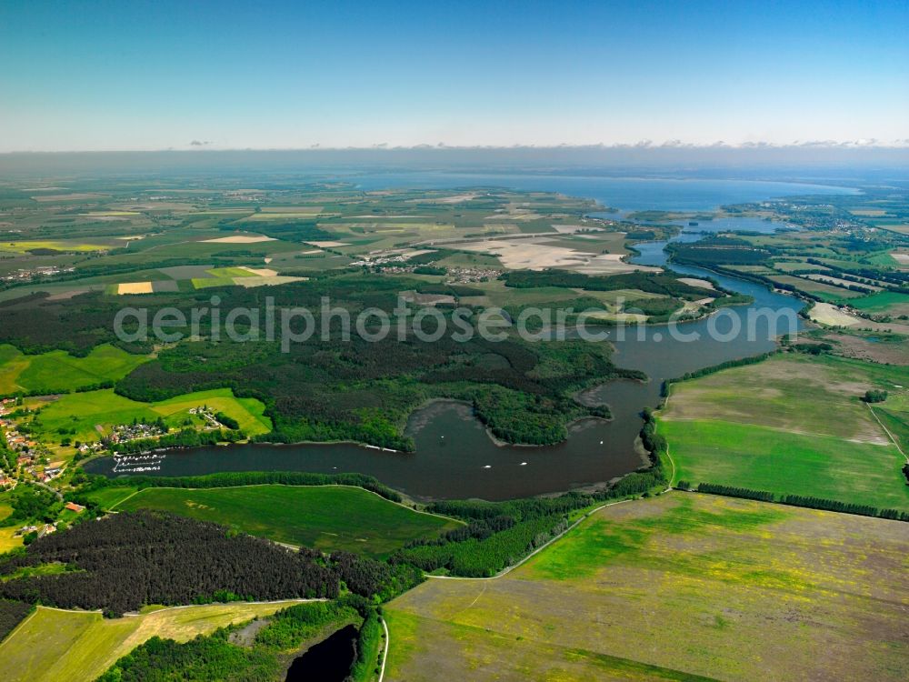 Priborn from above - The West end of the lake Müritzsee at the village of Buchholz in the Priborn borough of the state of Mecklenburg-Vorpommern. The lake belongs to a chain of lakes south of the river Müritz. In the North it connects to the Müritz sidearm. The village of Buchholz has its own yacht harbour and port